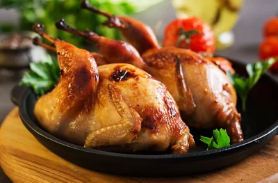 baked-quails-pan-dark-surface_11zon